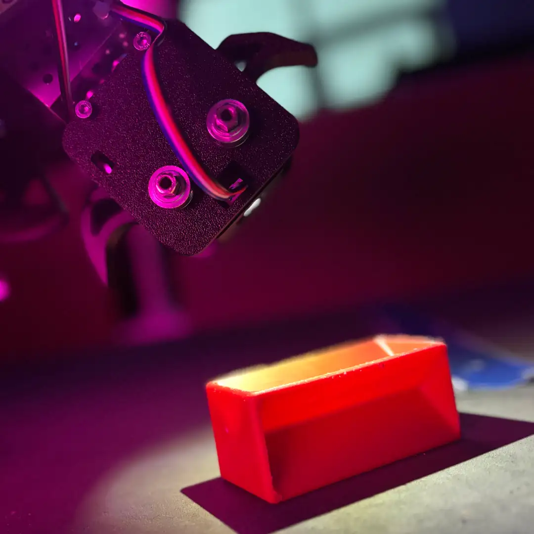 Photo of our robot grabbing a sample