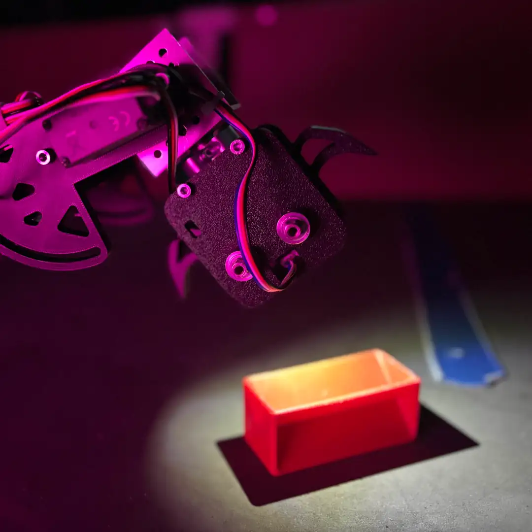 Photo of our robot grabbing a sample